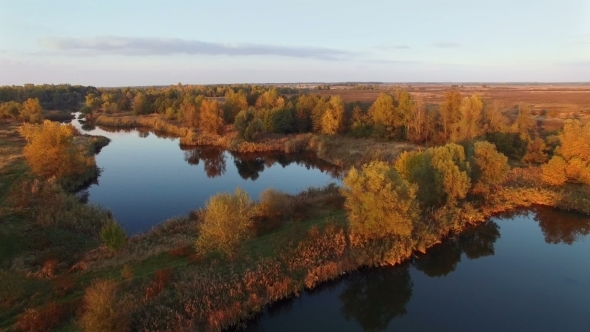 Flying Above Autumn Forest With Lake