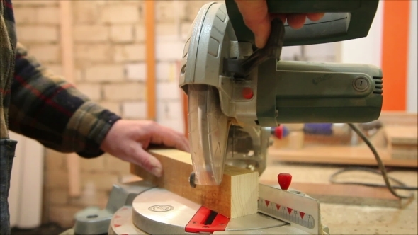 Carpenter Cuts Wooden Blocks Machine Tool