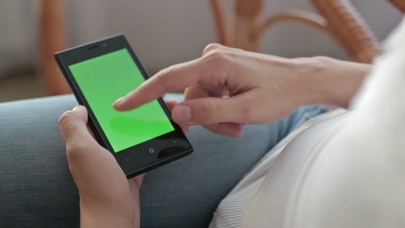 Woman Hands Touching And Scrolling Smartphone
