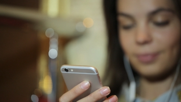 Young Hipster Girl Listening To music