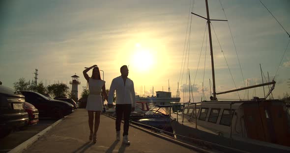 Romantic Couple Having Date on Embankment at Sunset