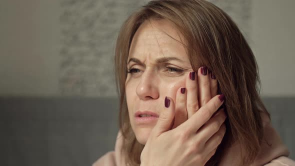 Woman Suffers From Severe Toothache