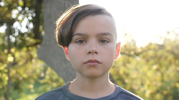 Teen Boy Looking at the Camera