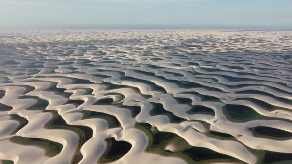 Sand dunes mountains and rain water lagoons at northeast brazilian paradise. alt