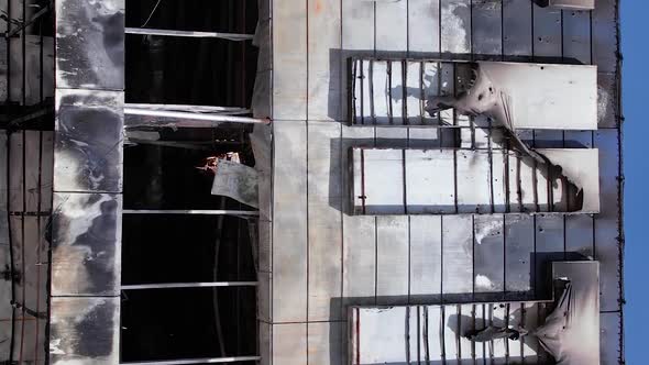 Vertical Video of a Bombed Shopping Center During the War in Bucha Ukraine alt