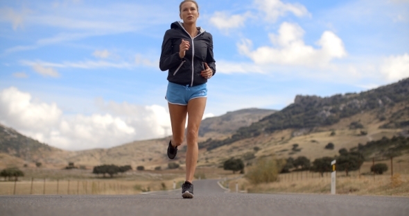 Fitress Girl Running On The Road In Mountains alt