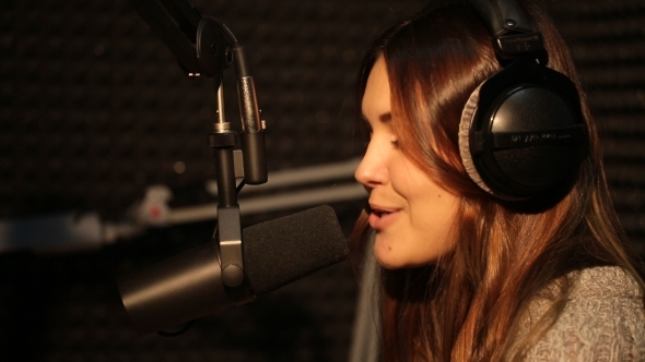 Beautiful Radio DJ In Studio Talking With Audience