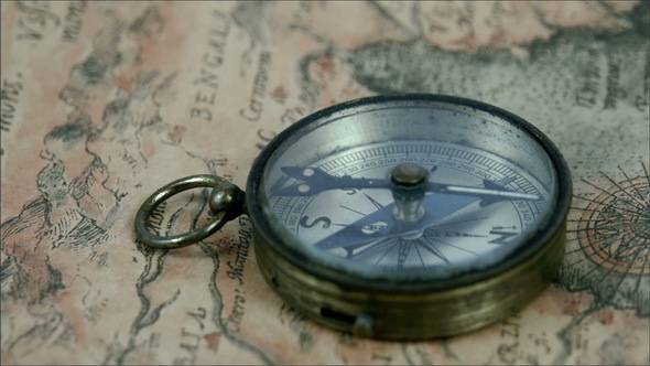 A Round Compass with its Pointer Moving