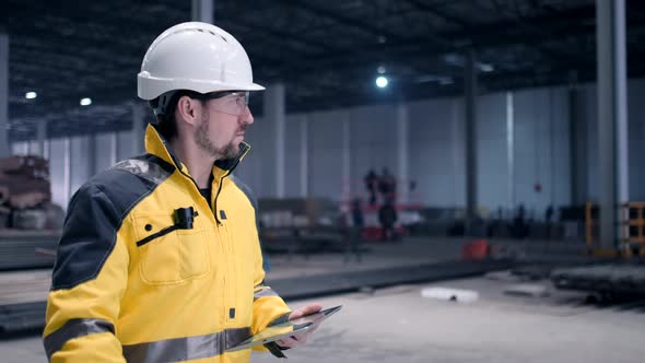 Portrait of Professional Heavy Industry Engineer / Worker Wearing Safety Uniform,  alt