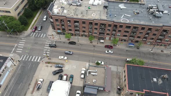 Birds eye view over older building being rehabbed in established neighborhood.