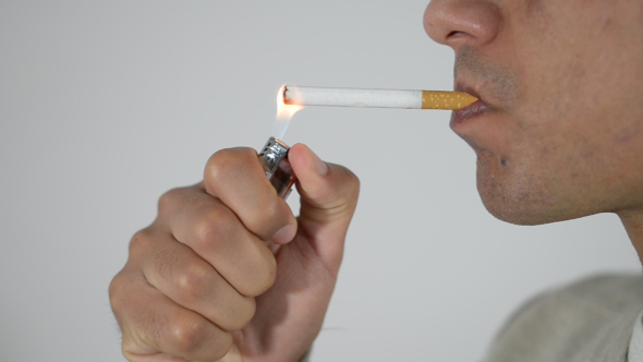 Man Burning and Smoking Cigarette alt