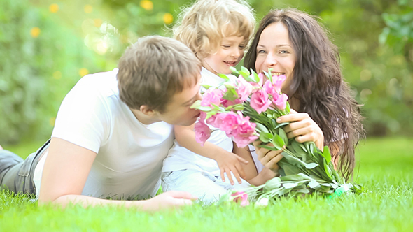 Happy Family In Spring Park