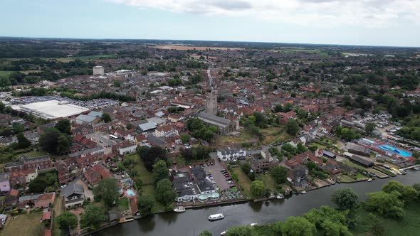 Beccles town in Suffolk UK high panning drone aerial view alt
