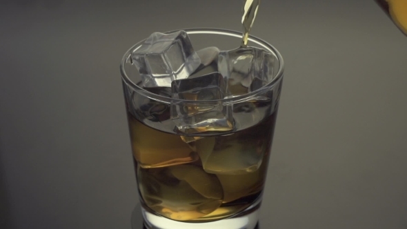 Whiskey Being Poured Into a Glass  Slow Motion