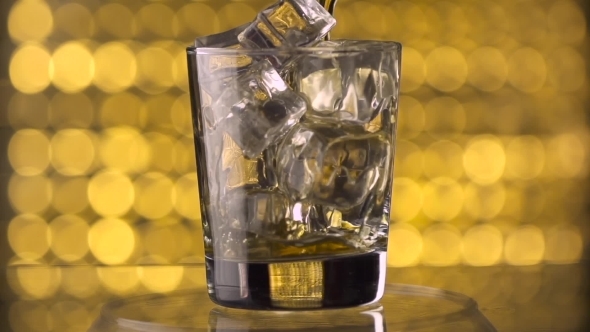 Pouring Whiskey Into Glass