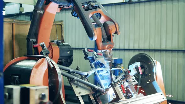 Automated Bicycle Frame Welding Process at a Factory alt