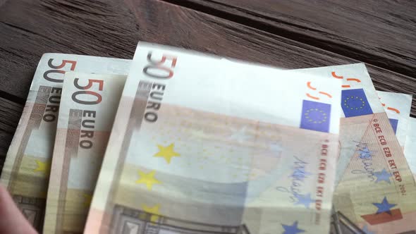 Man Counting Euro Banknotes 3 alt