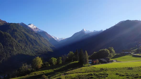 Snow-Capped Mountain Of Kitzsteinhorn From The Viewpoint Of Maiskogel In Austria. aerial alt