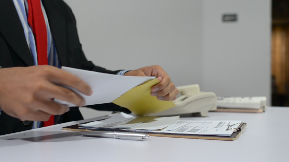 Reading and Putting Letter in Envelope alt