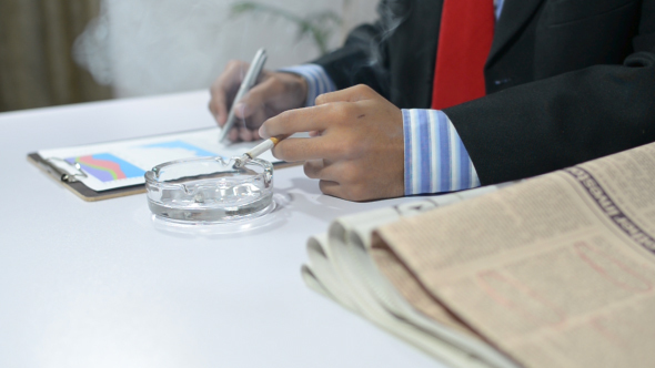 Smoking Businessman Working in Office alt