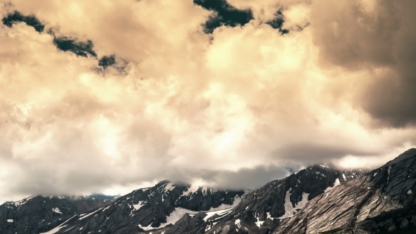 Most Clouded Sky High Above The Mountains alt