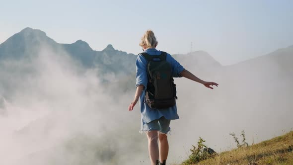Meeting the Clouds on Mountain Slope alt