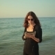 Woman Uses Tablet Pc At The Seaside  - VideoHive Item for Sale