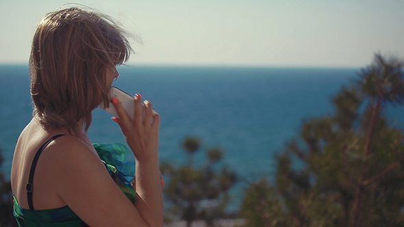 Girl Phone Talk By Sea  alt