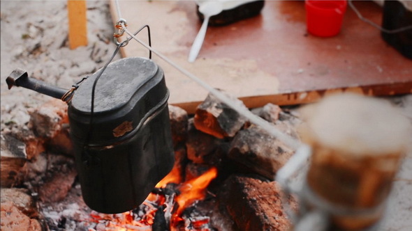 Preparation of Food in the Small Kettle on Nature 