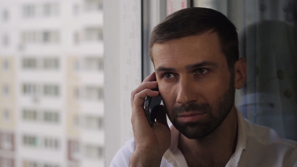 The Man At The Window Calling On The Phone