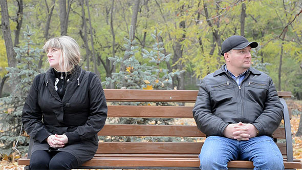 Sad Couple on a Bench