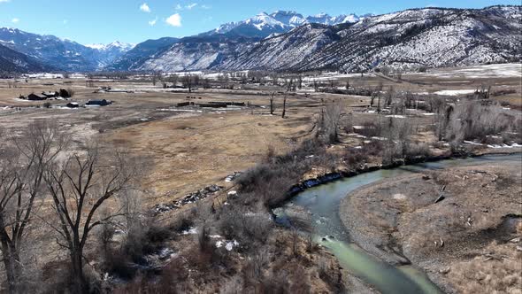 Uncompahgre River Ridgway Colorado Aerial Shot Loooking Towards San Juan Mountain Range alt