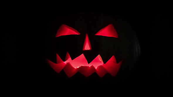 Scary Halloween Pumpkin Jack-O-Lantern Candle Lit