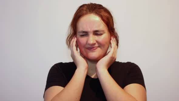 Woman Suffering from Ear Pain