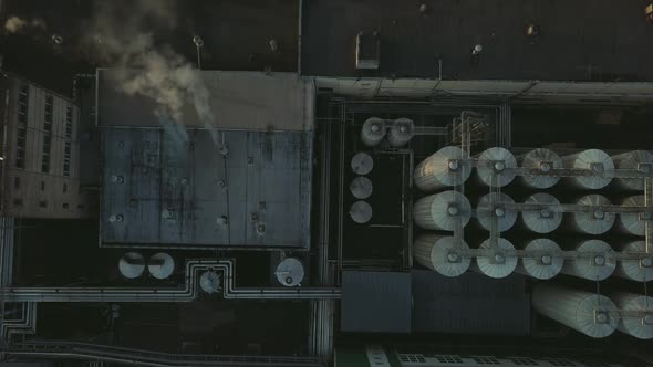 Aerial View of a Drone Flying Over the Beer Production Plant Several Rows of Tanks