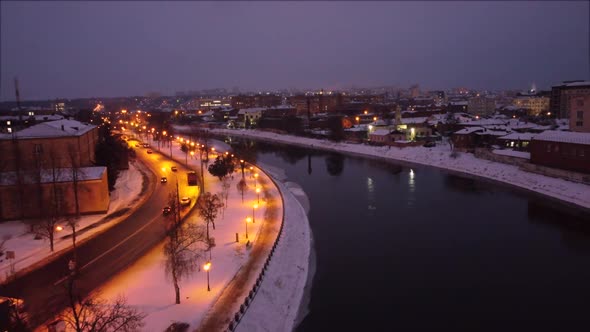Evening fly above wintery river in Kharkiv city