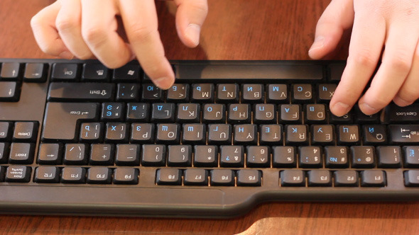 Businessman Working In Office And Typing On Keyboard