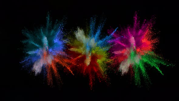 Super Slowmotion Shot of Color Powder Explosions Isolated on Black Background at 1000Fps alt