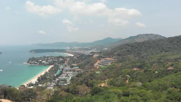 Panoramic view of Phuket coastline. Tropical beach and dense rainforest  alt