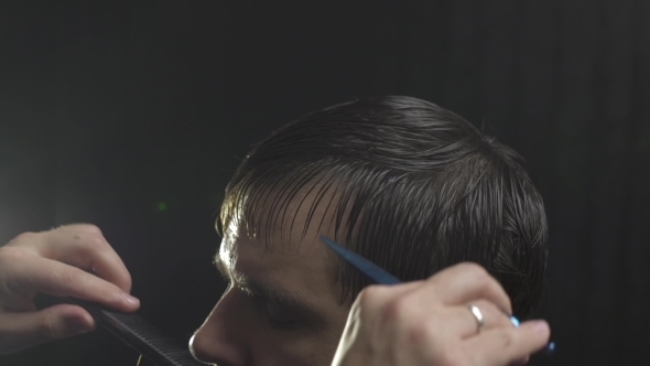 Hairdresser Finishing Male Haircut. Cutting Bangs
