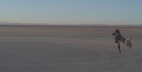 Girl Walking In The Desert