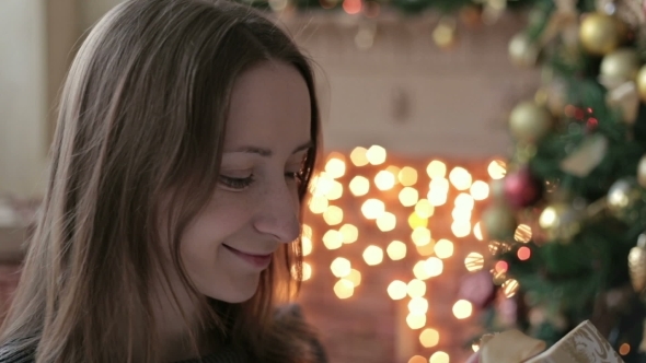 Happy Young Woman With Christmas Present Box