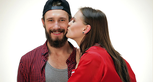 Students posing together on a white background