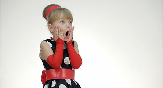 Kid girl posing in a studio
