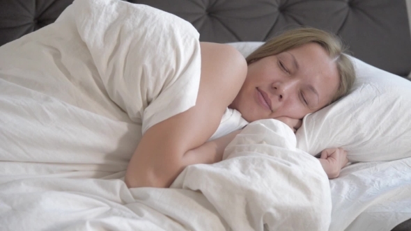 Sleeping Woman, Smiling And Dreaming