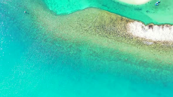 Aerial top down nature of beautiful coastline beach adventure by blue sea and bright sandy backgroun alt