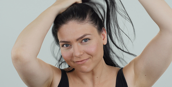 Woman Playing with Her Hair