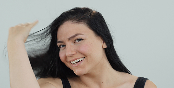 Woman Playing with Her Hair