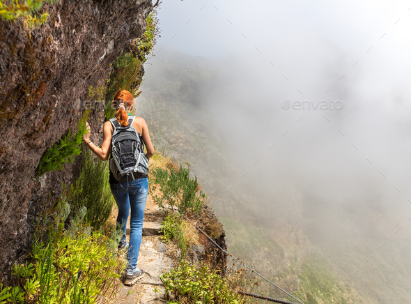 Young girl in mountains - Stock Photo - Images