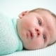 Blue-eyed Newborn Baby Lying And Looking Around In - VideoHive Item for Sale